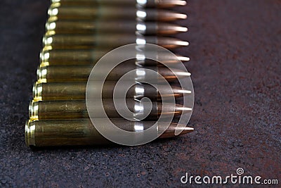 Group of ammunition on a rusted metal background Stock Photo