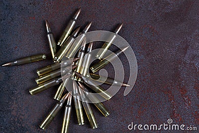 Group of ammunition on a rusted metal 223 rem Stock Photo