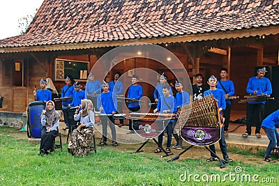 Angklung players in action at an event Editorial Stock Photo