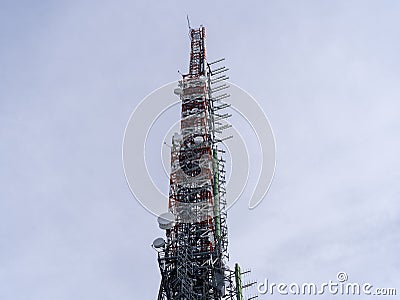 Group of antennas, satellite dishes for telecommunications, television broadcast, cellphone, radio and satellite Stock Photo