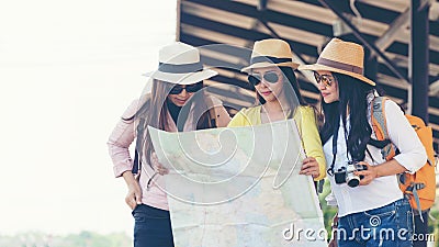 Group of asia women traveler and tourist traveling backpack holding map Stock Photo