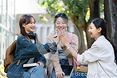 Group of Asian college student happy and celebrate after exam success Stock Photo