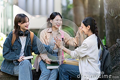 Group of Asian college student happy and celebrate after exam success Stock Photo