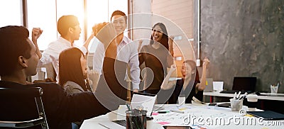 Group of Asian team creative business people Happy to be successful partnership teamwork concept. Stock Photo