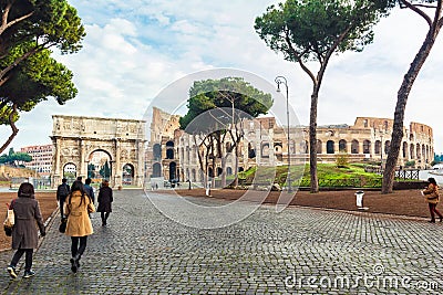 Group of asian tourist heading to Colosseum. Editorial Stock Photo