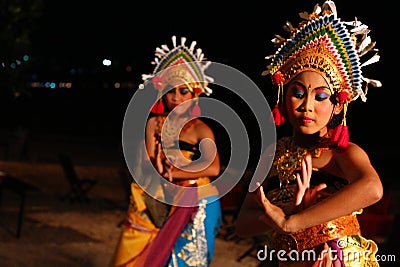 Group of Balinese dancers perform on beach Editorial Stock Photo