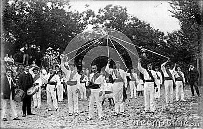 Group of Basque dancers with colored ribbons Editorial Stock Photo