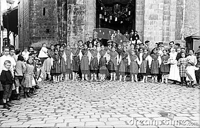 Group of Basque girls dancing in front of a church Editorial Stock Photo
