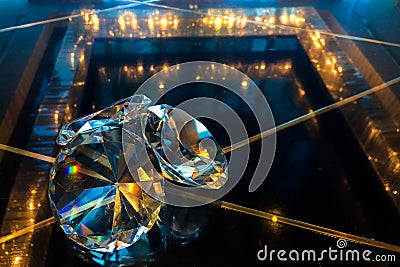 Group of Big Diamonds Shining on Reflection Black Glass Table at The Corner used as Template Stock Photo