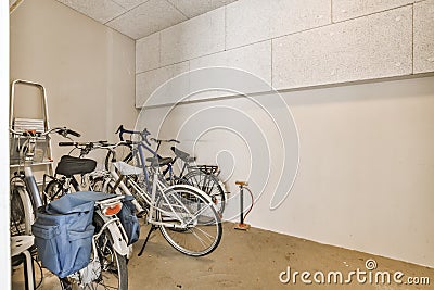 a group of bikes parked in a room Stock Photo