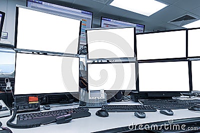 Group of blank monitors and screen on security desk or control room for monitor process or stock data trading Stock Photo