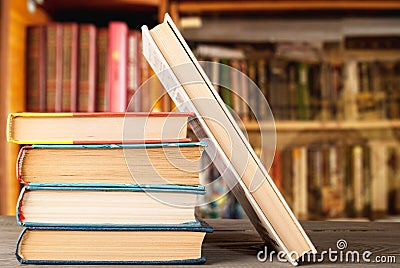 Group of books on a wooden surface Stock Photo