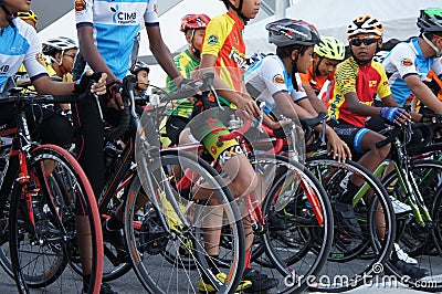 A group of boys dressed in cycling sports along with their bikes Editorial Stock Photo