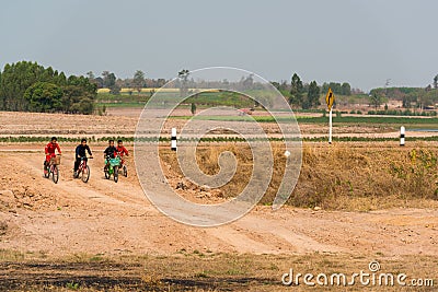 Group boys riding bicycles together Editorial Stock Photo
