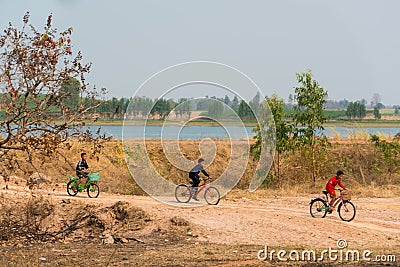 Group boys riding bicycles together Editorial Stock Photo