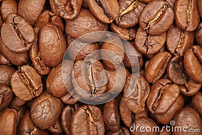 Group of brown coffee grains background, macro, close-up Stock Photo