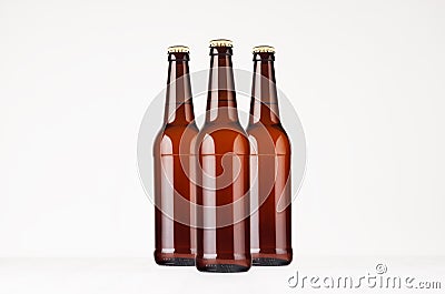 Group brown longneck beer bottles 500ml mock up. Stock Photo