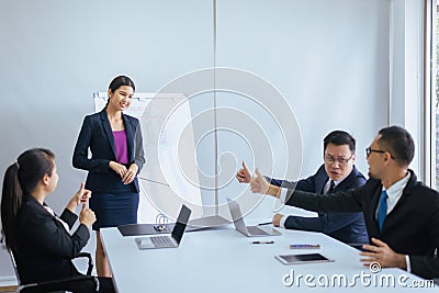 Group of business asian people hands showing thumb up after meeting,Success presentation and coaching seminar at office Stock Photo
