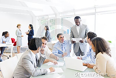 Group Of Business People Around The Conference Table Stock Photo