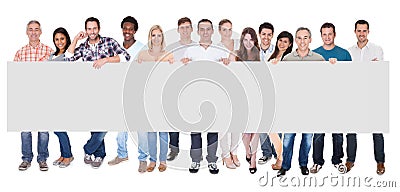 Group of business people with a blank banner Stock Photo