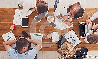 Group of business people exhausted sleep in office, top view Stock Photo