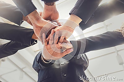 Group of business people joining hands. Team work concept Stock Photo