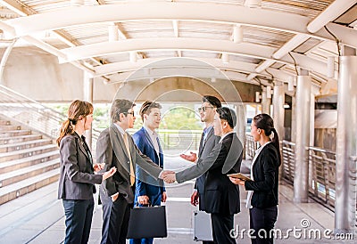 Group of Business people shaking hands, Teamwork finishing up a meetingpartners greeting each other after signing contract Stock Photo