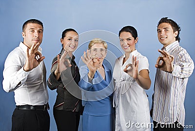 Group of business people showing okay sign Stock Photo