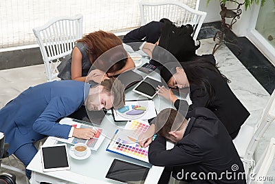 Group of business people sleeping resting in the conference room Stock Photo