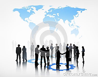 Group Of Business People Standing Beneath The World Stock Photo