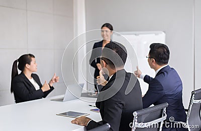 Group of business people tumb up hands to speaker after meeting,Success presentation and coaching seminar at modern office Stock Photo