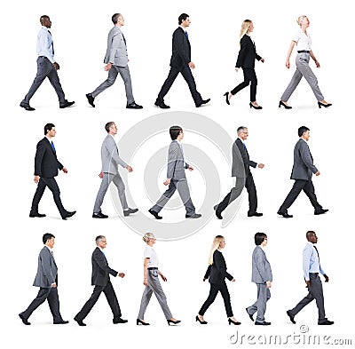 Group of Business People Walking in One Direction Stock Photo
