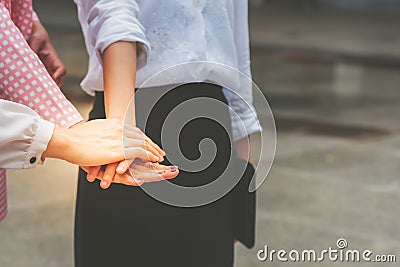 group of business women, coordinating hand Stock Photo