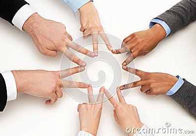 Group of businesspeople showing v-sign Stock Photo