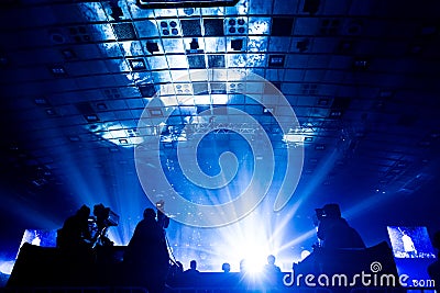 A group of cameramen working during the concert. Stock Photo