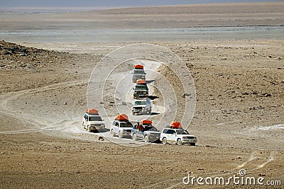 Group of camper vans running on the desert road, Eduardo Avaroa Andean Fauna National Reserve, Potosi, Bolivia Editorial Stock Photo