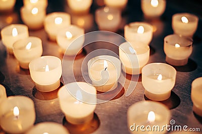 Group Of Candles In Church. Candles Light Stock Photo