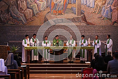 A group of Catholic priest and sisters in the Holy Mass Editorial Stock Photo