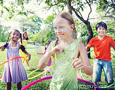 Group Cheerful Children Playing Hulahoop Concept Stock Photo