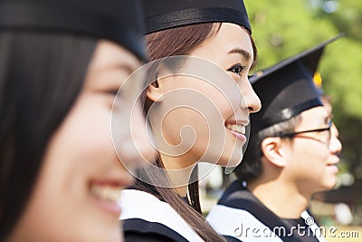 A group cheerful college graduates at graduation Stock Photo