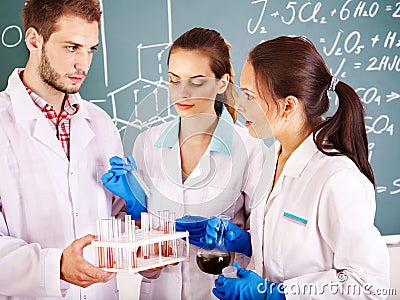 Group chemistry student with flask. Stock Photo