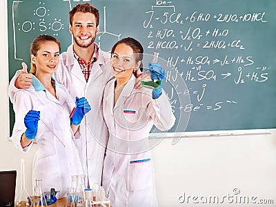 Group chemistry student with flask. Stock Photo