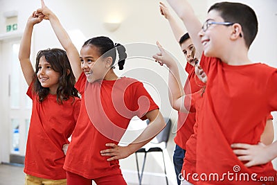 Group Of Children Enjoying Drama Class Together Stock Photo