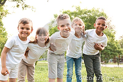 Group of children huddling. Volunteer project Stock Photo