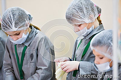 A group children medical training. A group of children are studying surgery. Teaching medicine. Young doctors at a seminar in a Editorial Stock Photo