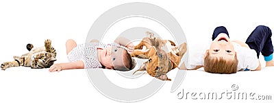 Group of children and pets, laying on a back Stock Photo