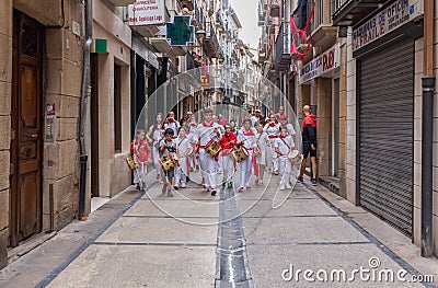 Children playing drums in the streets of Estelle during the Bull Runs festivities. Navarre, Spain. Editorial Stock Photo