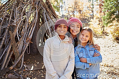 Group Of Children Playing In Forest Camp Together Stock Photo