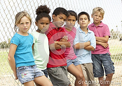 Group Of Children Playing In Park Stock Photo