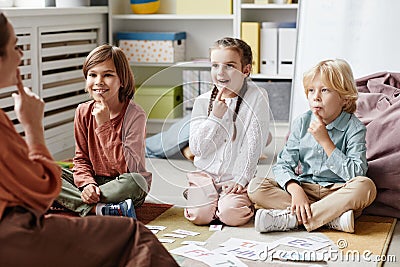 Children learning to read new words Stock Photo
